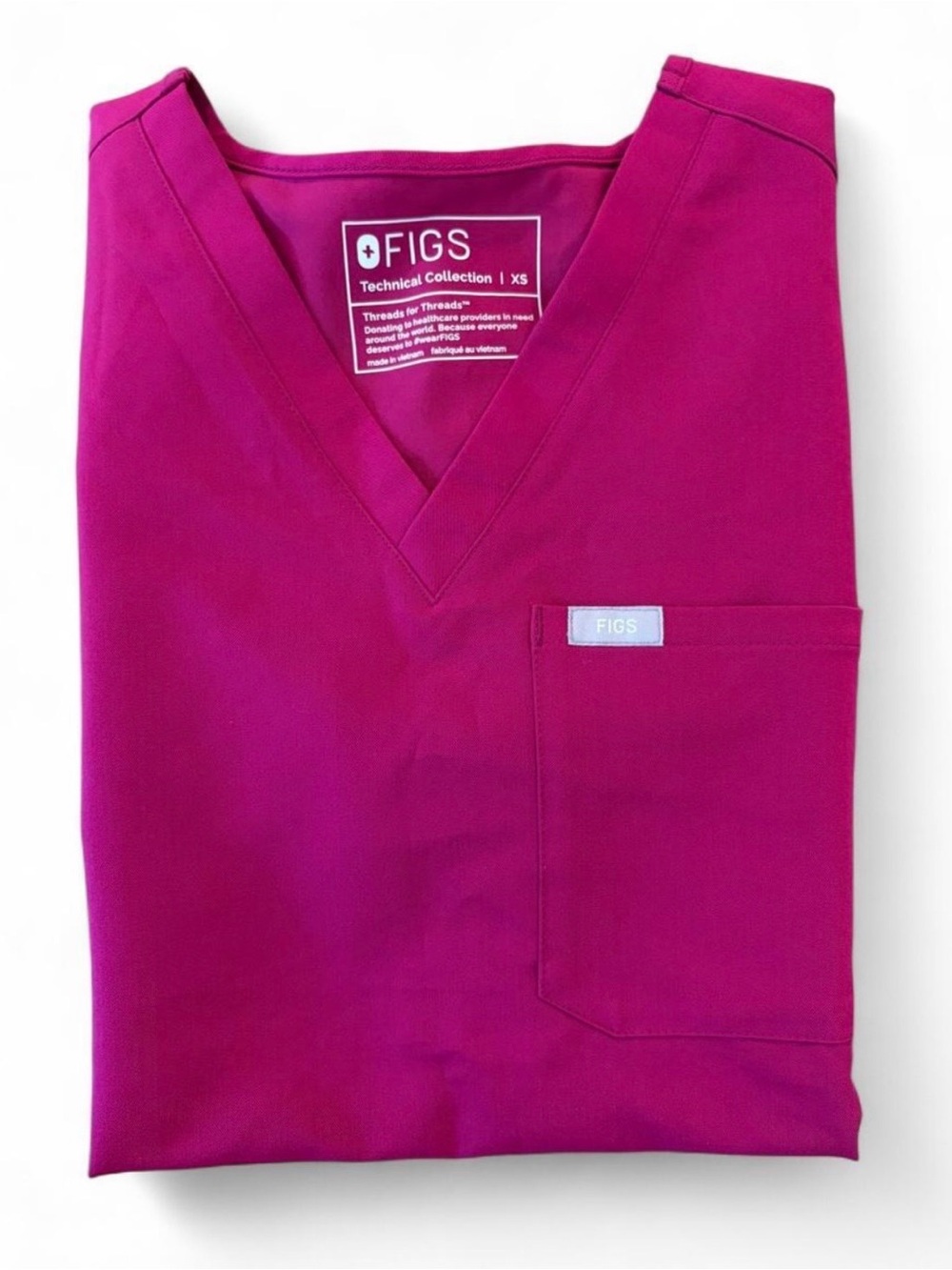 Figs women’s XS Catarina scrub top in magenta. Classic V-neckline.